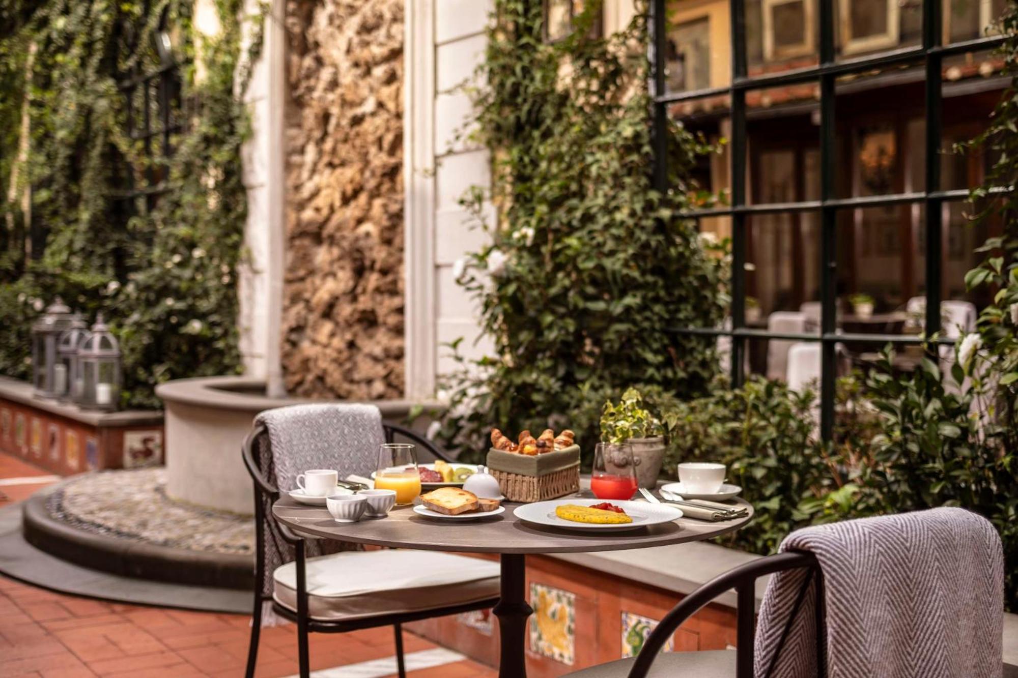 Tivoli Palazzo Gaddi Firenze Hotel Buitenkant foto The hotel's courtyard